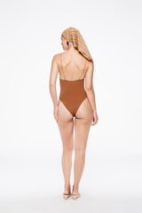 the C one piece in amber