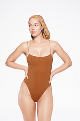 the C one piece in amber